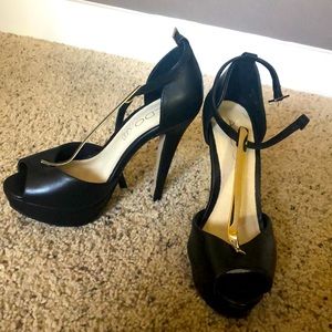 Black and gold high heels